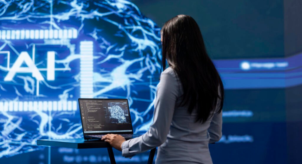 Admin using laptop to maintenance artificial intelligence neural networks